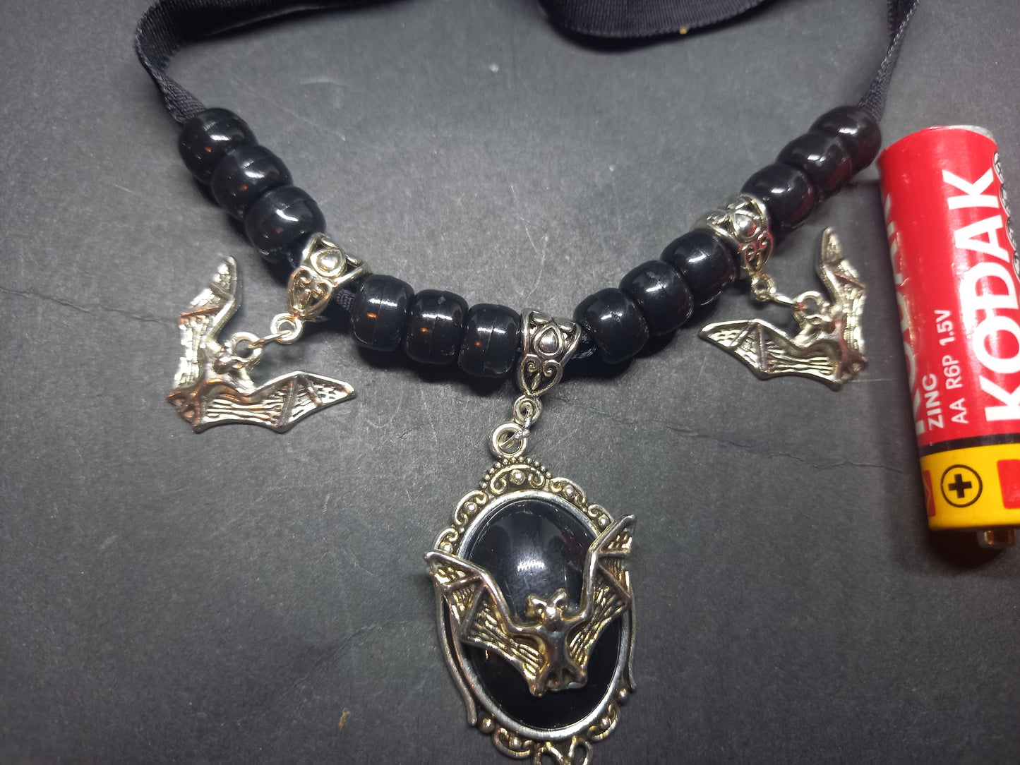 Goth Gothic Witchy vampire "Ornate open wing bat with matching bat charms and skull beads"on Black velvet Ribbon Choker
