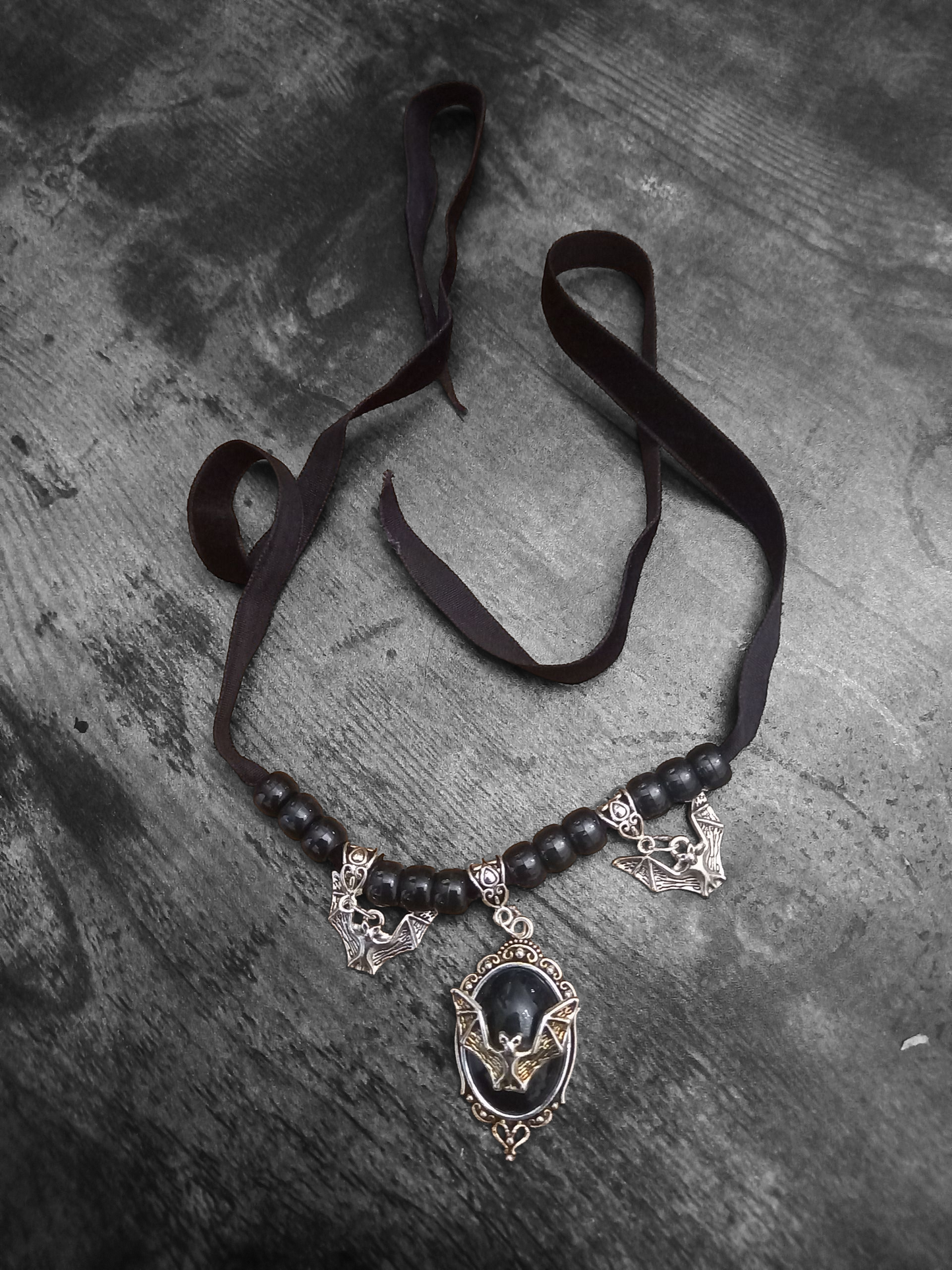 Goth Gothic Witchy vampire "Ornate open wing bat with matching bat charms and skull beads"on Black velvet Ribbon Choker