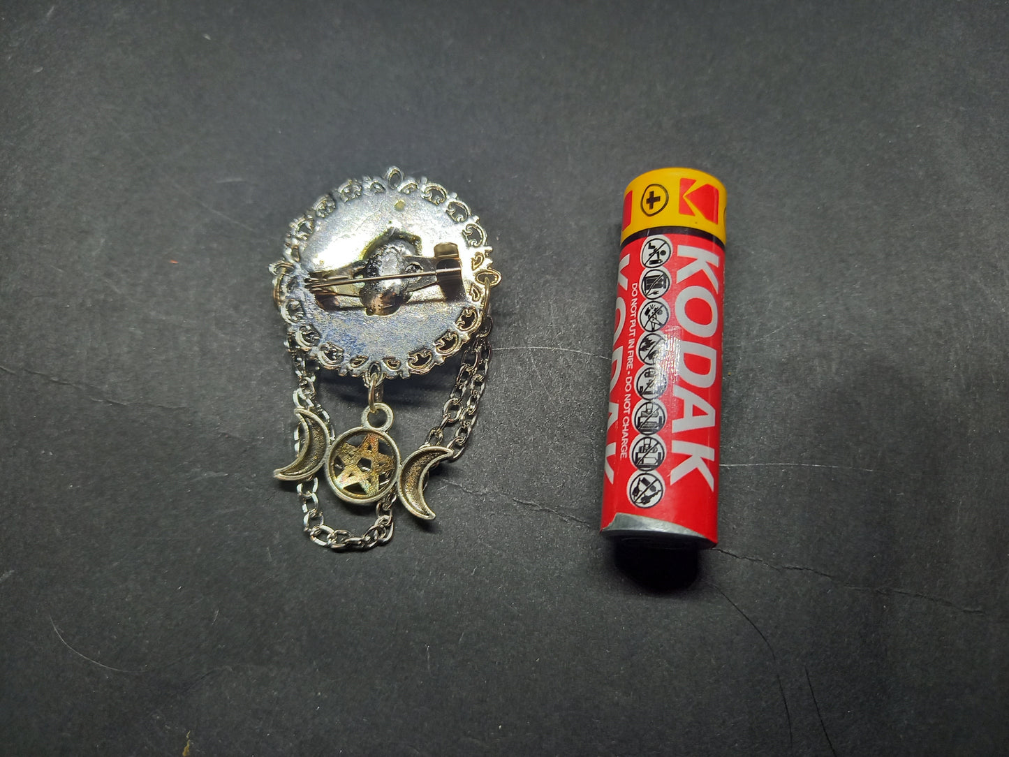 Oddity curiosity goth gothic witchy killstar magic magick occult "naked witch on broomstick" ornate broach with chains