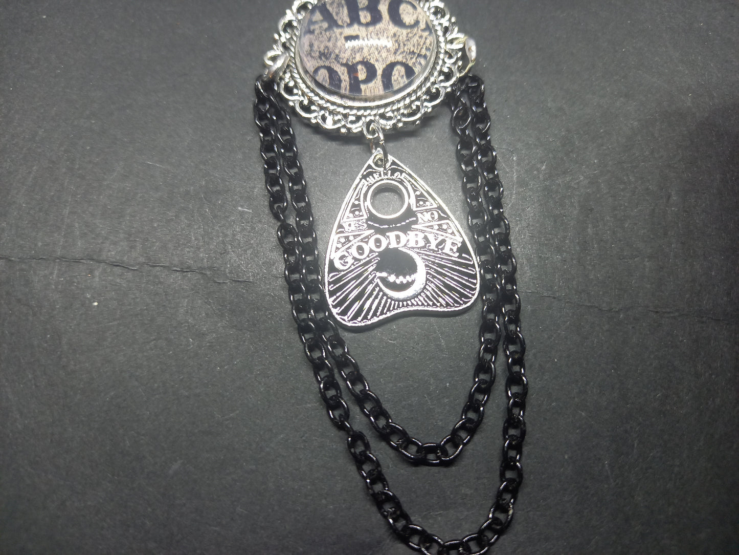 Oddity curiosity  gothic  witchy  Killstar occult " Annabelle inspired double image Ornate Brooch "with spirit board and ouija planchette & chains