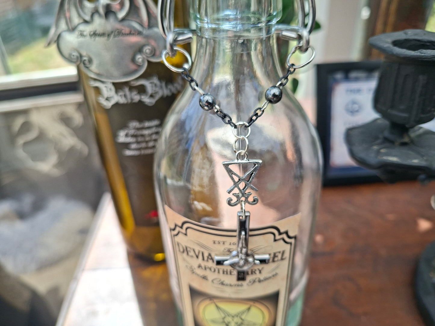 apothecary bottle "Unholy Water"  with satanic rosary detail : Oddity curiosity Gothic  Witchy Occult homewares