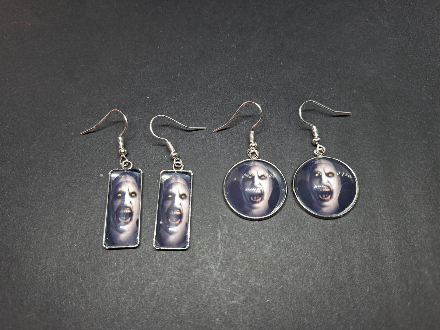 Earrings ,The Conjuring inspired "Nun" round or rectangle